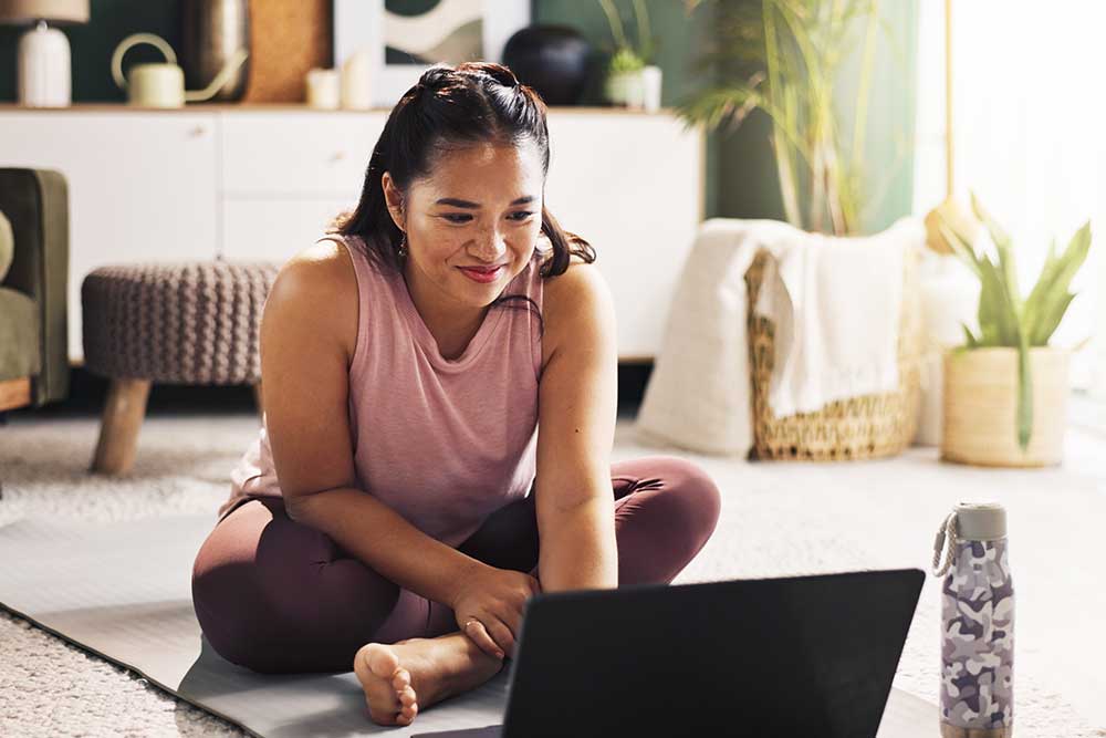 Person at home viewing bite-size exercises online